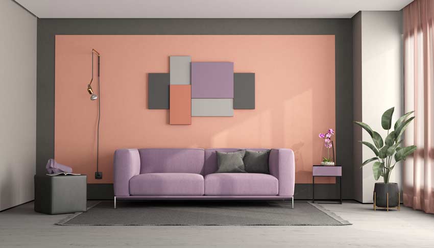 salon élégant avec mur rose et divan violet clair