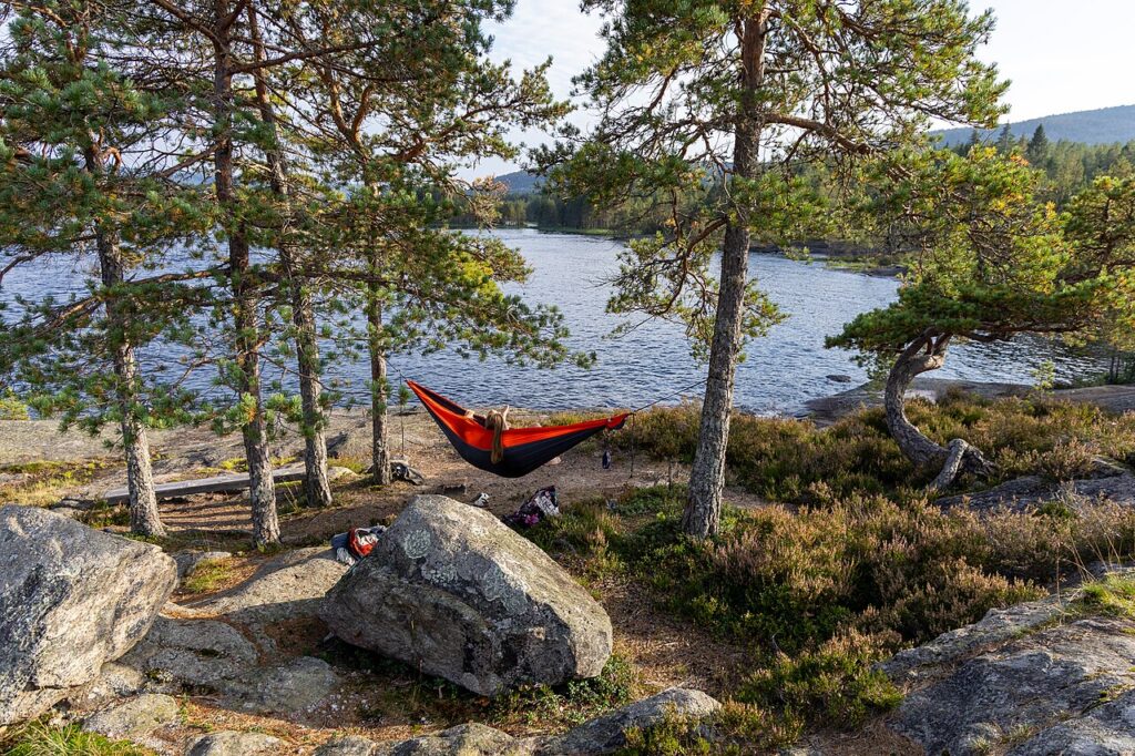 IKEA - Person camping in a hammock near Volefossen in Evje og Hornnes, Norway